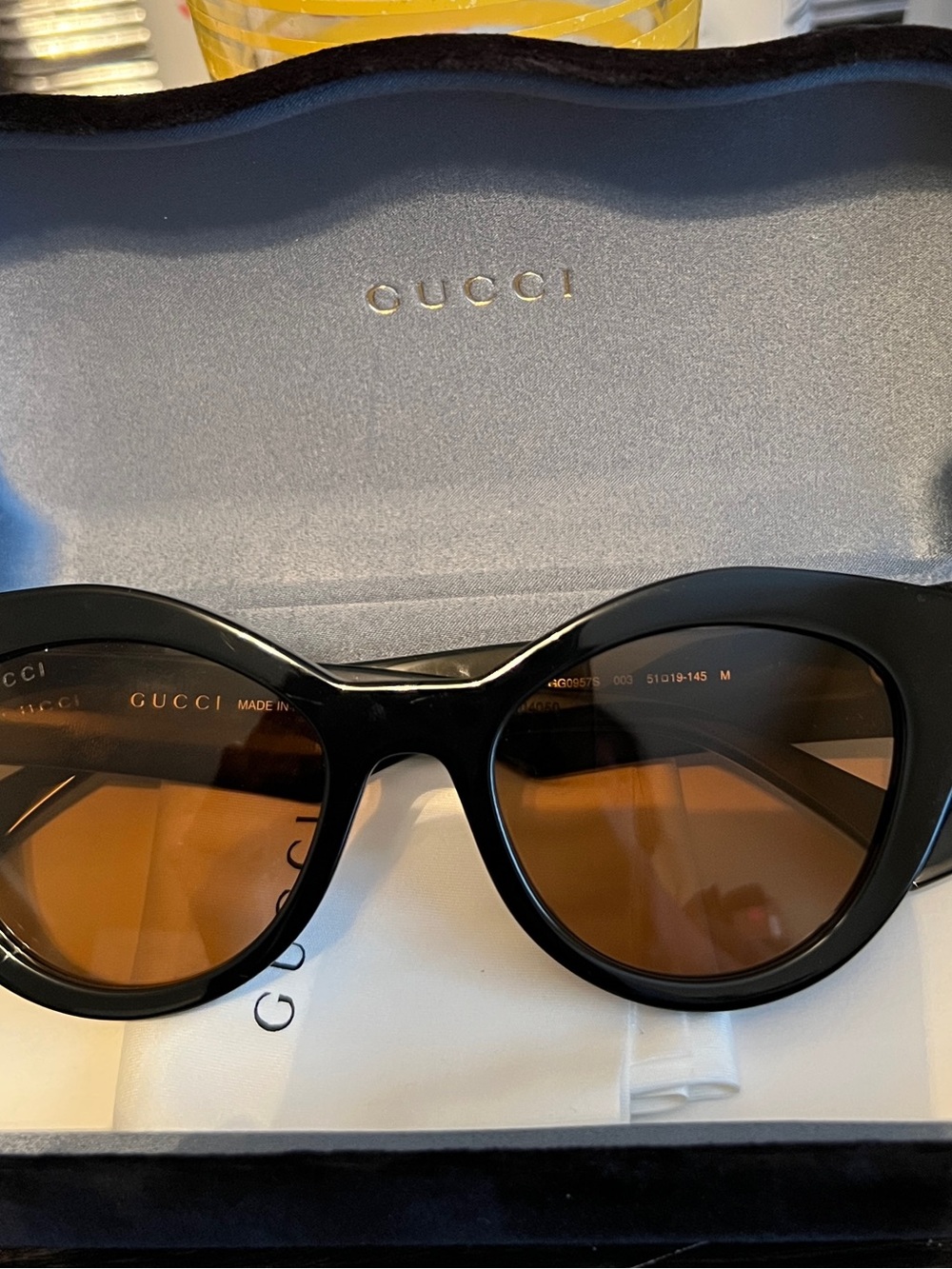 Gucci Women’s Black Frame Sunglasses with Brown Lenses